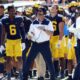 Michigan football, Sherrone Moore, Jim Harbaugh, suspension