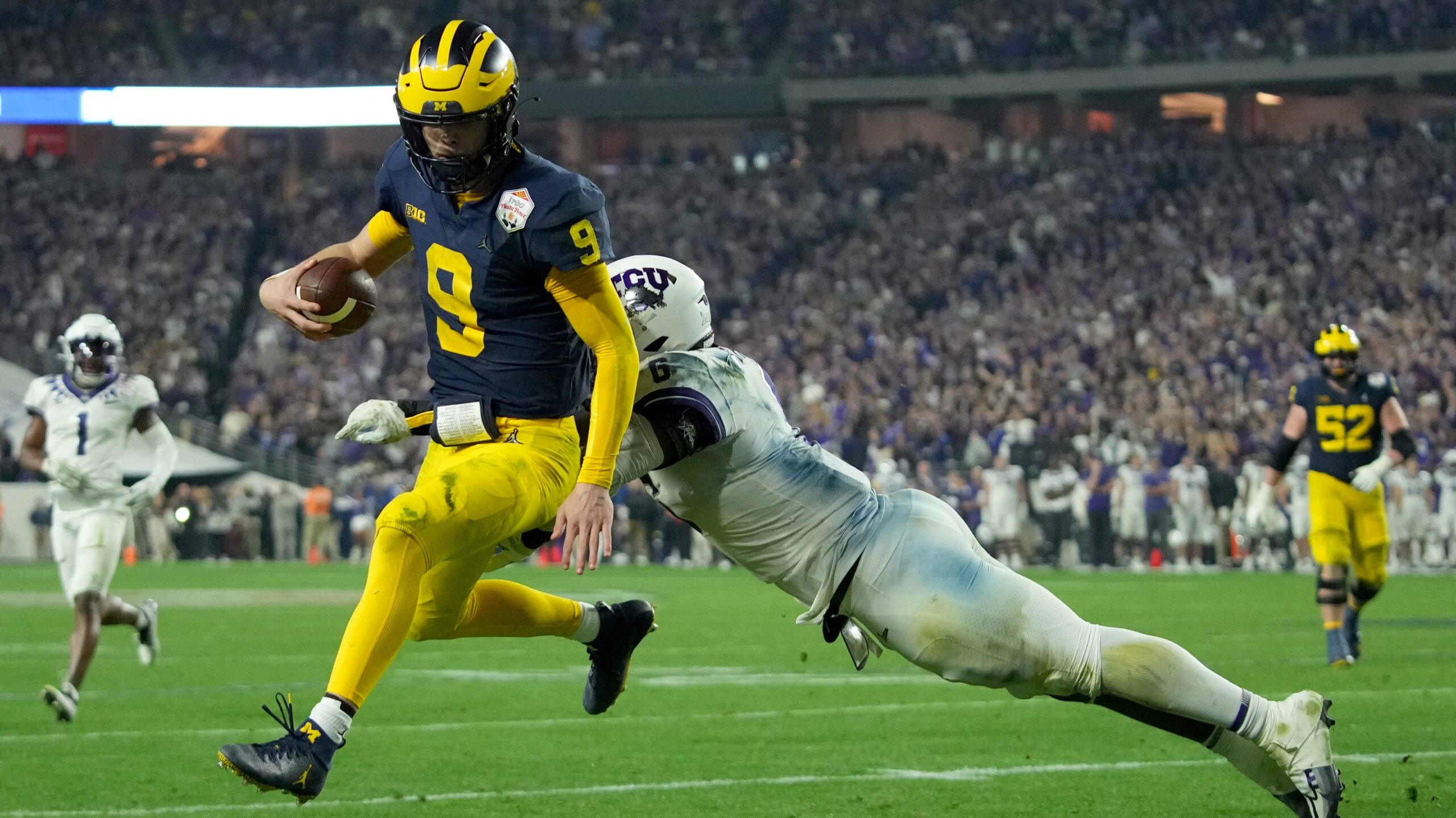 Michigan football quarterback, JJ McCarthy, Kirk Campbell