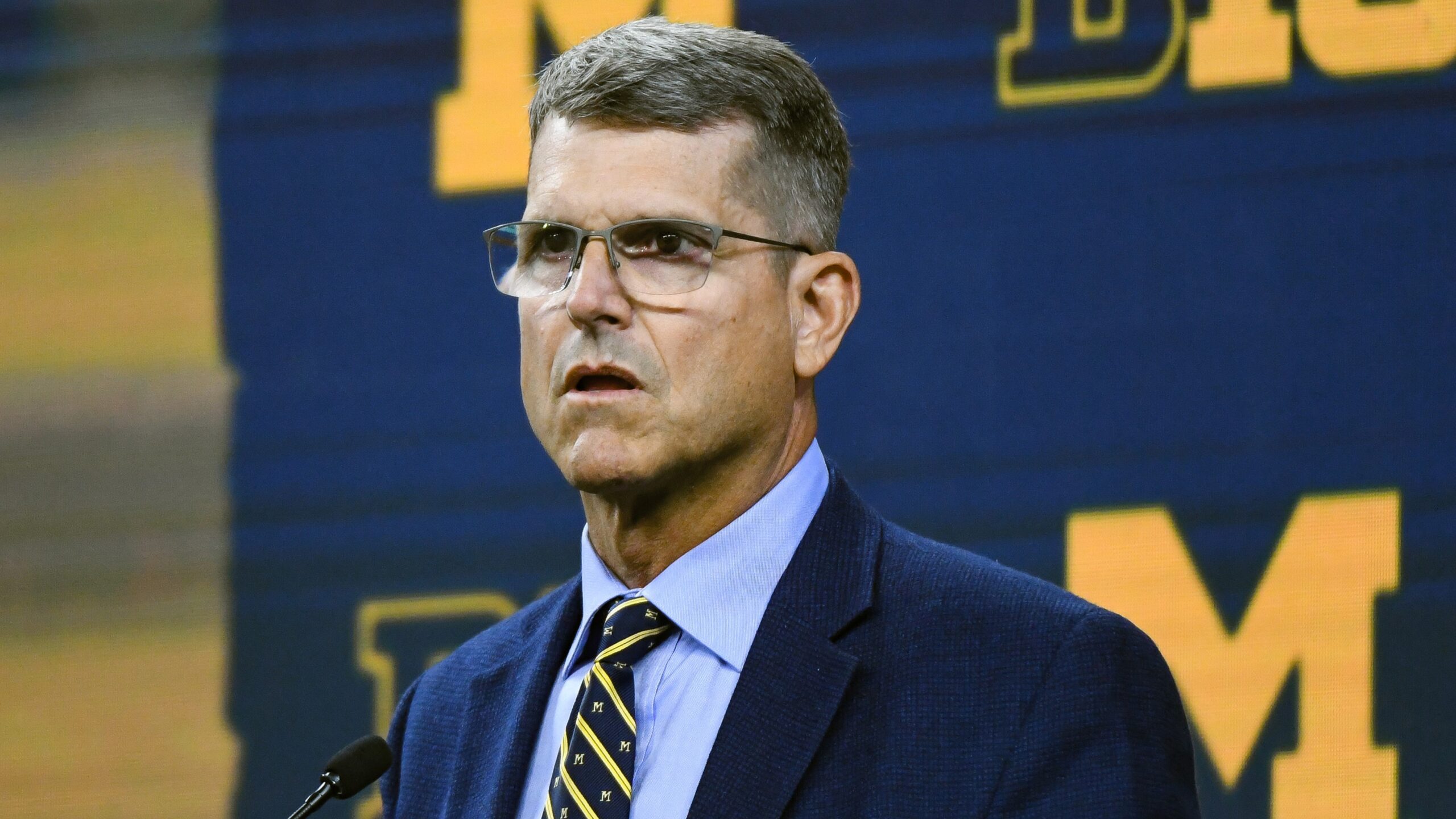 Michigan football coach, Jim Harbaugh, suspension