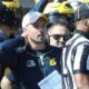 Michigan football staffer Connor Stalions sign-stealing during a game