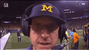 Jim Harbaugh is coaching football for the Michigan Wolverines