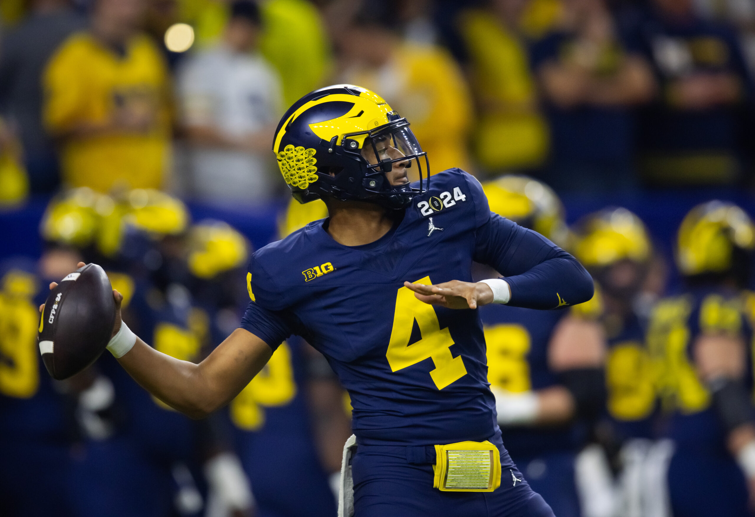 Michigan football quarterback, Jim Harbaugh, Alex Orji, Jayden Denegal, Sherrone Moore