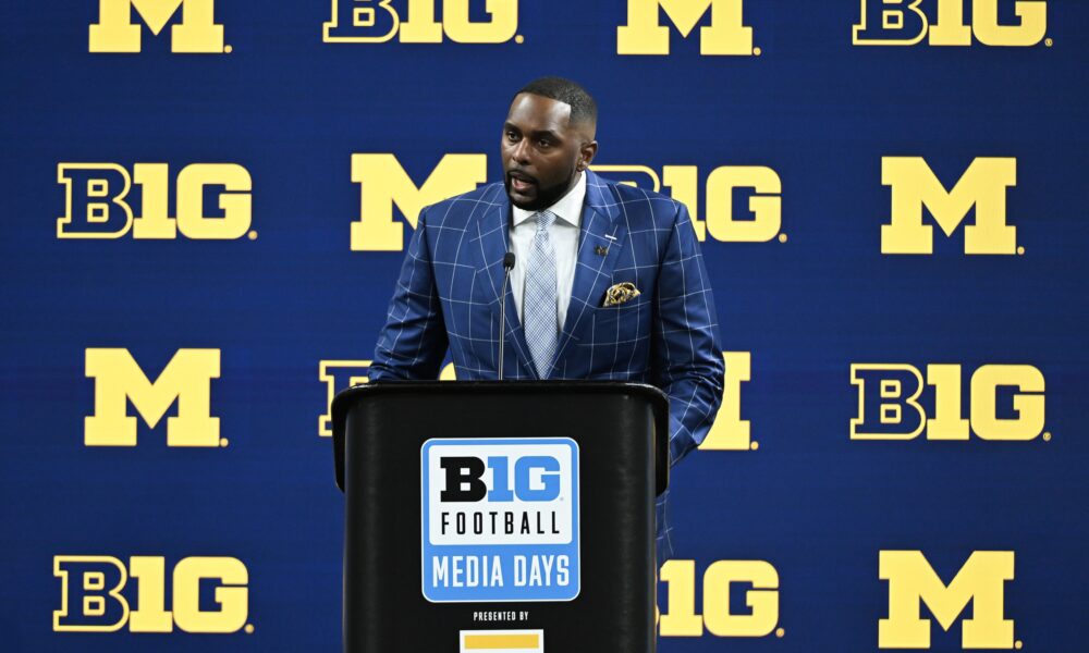 Jul 25, 2024; Indianapolis, IN, USA; Michigan Wolverines head coach Sherrone Moore speaks to the media during the Big 10 football media day at Lucas Oil Stadium. Mandatory Credit: Robert Goddin-USA TODAY Sports