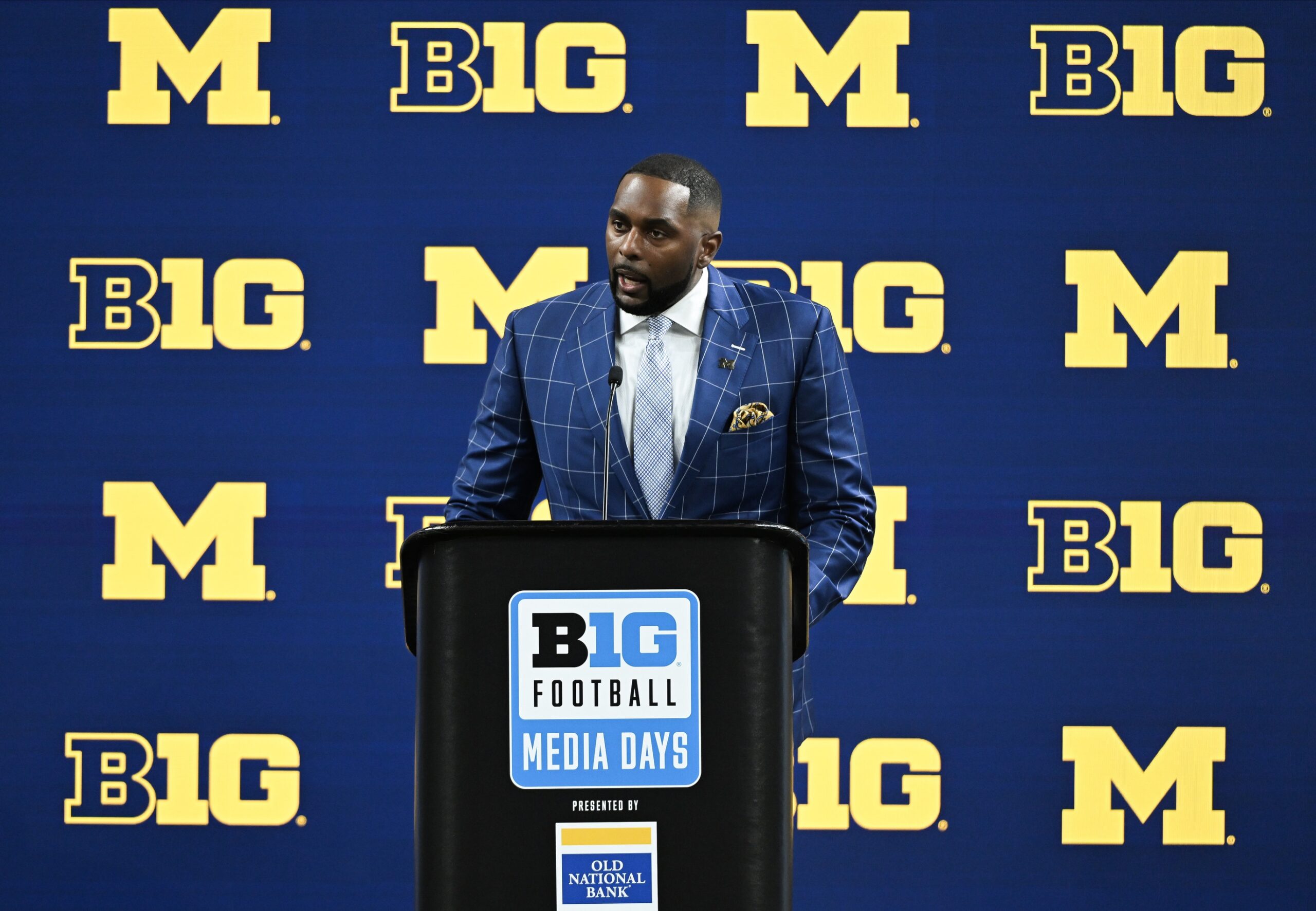 Jul 25, 2024; Indianapolis, IN, USA; Michigan Wolverines head coach Sherrone Moore speaks to the media during the Big 10 football media day at Lucas Oil Stadium. Mandatory Credit: Robert Goddin-USA TODAY Sports