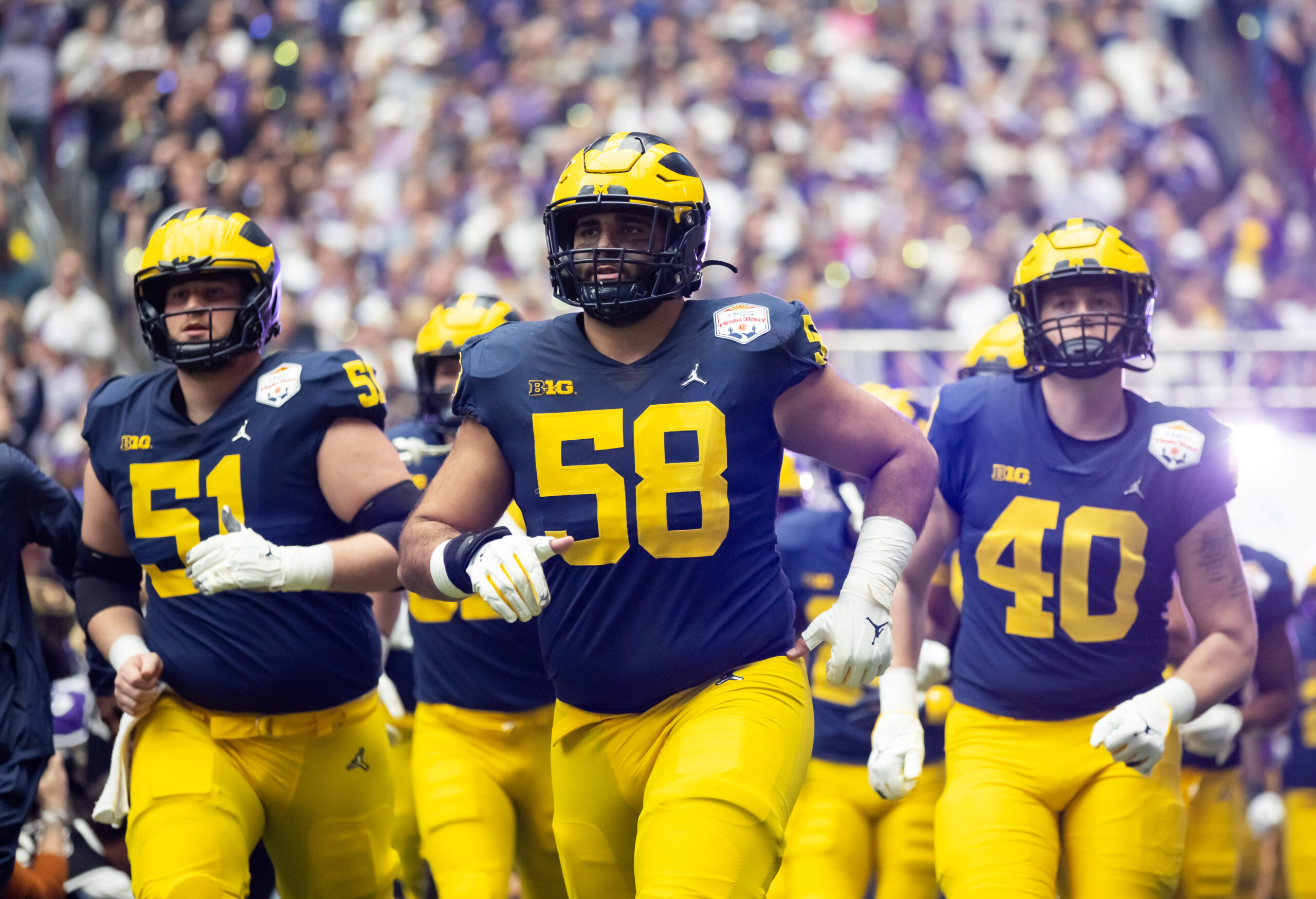 Dec 31, 2022; Glendale, Arizona, USA; Michigan Wolverines offensive lineman Giovanni El-Hadi (58) against the TCU Horned Frogs in the 2022 Fiesta Bowl at State Farm Stadium. Mandatory Credit: Mark J. Rebilas-USA TODAY Sports