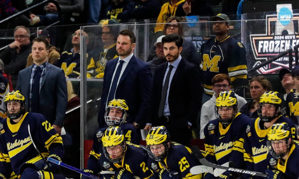 Michigan head coach Brandon Naurato watches a play against Boston College during the third period of the Frozen Four semifinal game at Xcel Energy Center in St. Paul, Minn. on Thursday, April 11, 2024.