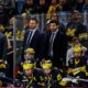 Michigan head coach Brandon Naurato watches a play against Boston College during the third period of the Frozen Four semifinal game at Xcel Energy Center in St. Paul, Minn. on Thursday, April 11, 2024.