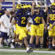 Aug 31, 2024; Ann Arbor, Michigan, USA; Michigan Wolverines defensive back Will Johnson (2) runs the ball after he makes an interception in the second half against the Fresno State Bulldogs at Michigan Stadium. Mandatory Credit: Rick Osentoski-USA TODAY Sports