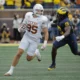 texas beats michigan football and vaults their ap poll ranking