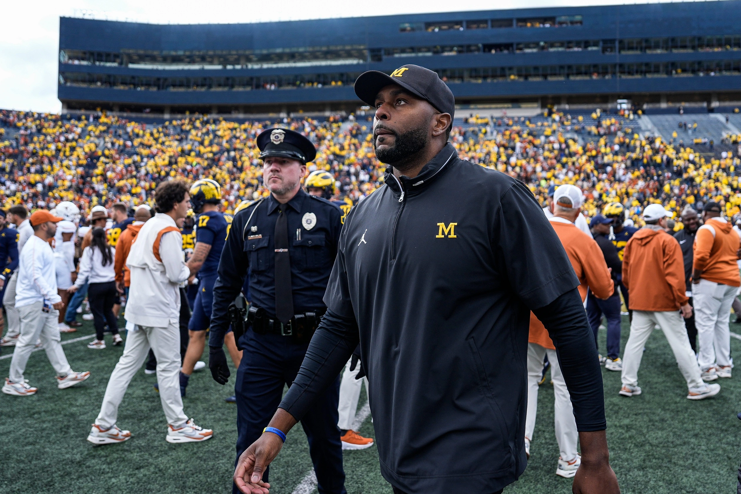 sherrone moore walks off after michigan football loss to texas