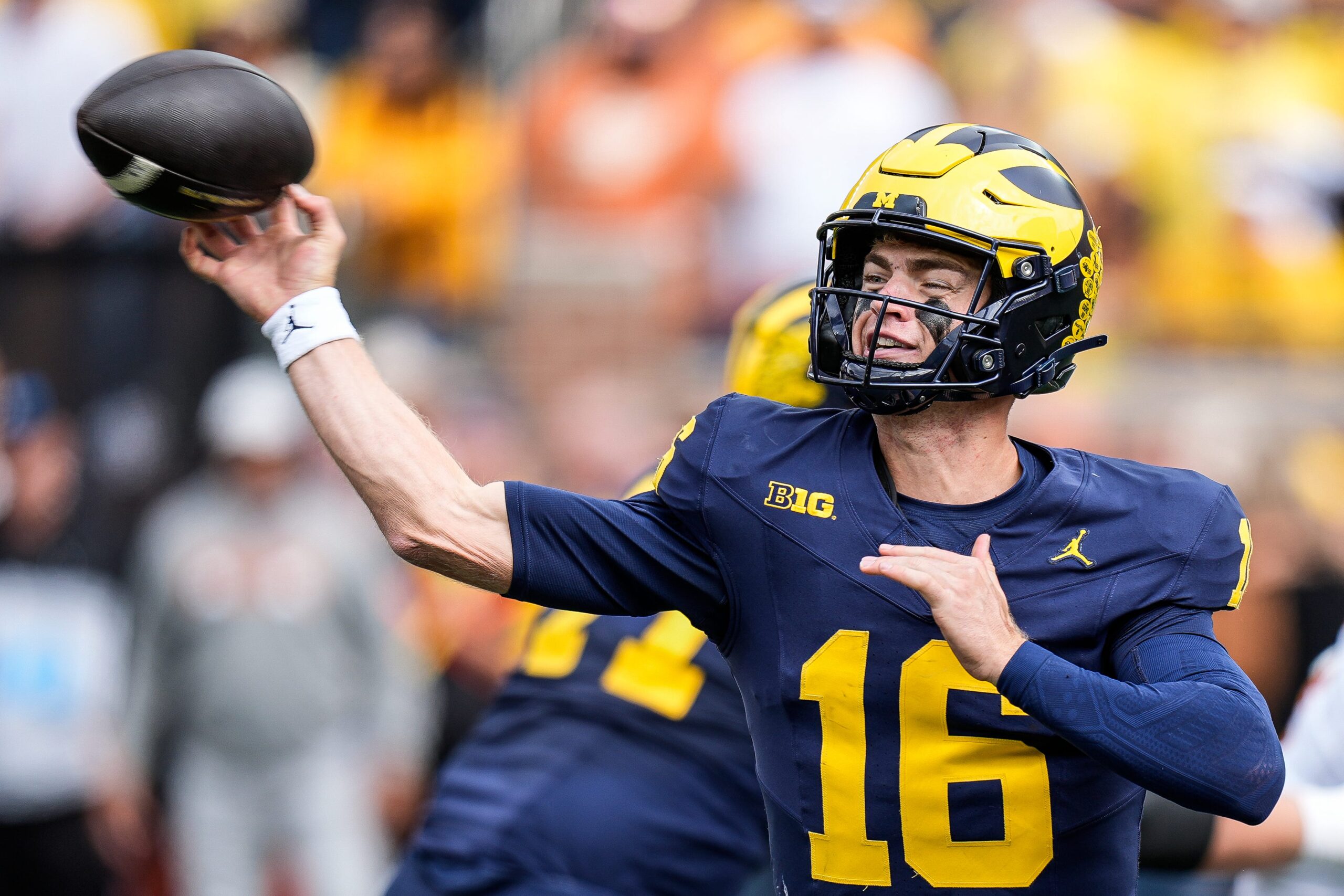 Michigan quarterback Davis Warren (16) makes a pass against Texas during the second half at Michigan Stadium in Ann Arbor on Saturday, September 7, 2024.