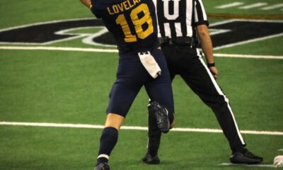 Colston Loveland jumping up to catch a pass