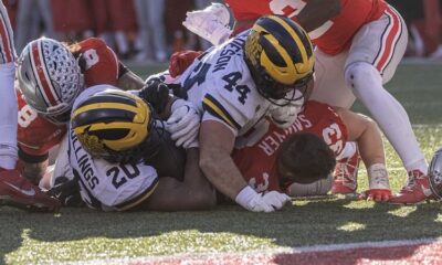 Max Bredeson atop Jack Sawyer at Ohio Stadium