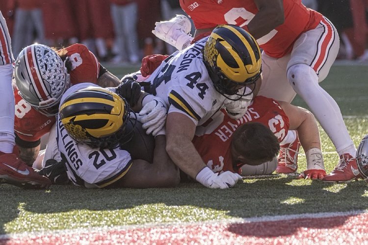 Max Bredeson atop Jack Sawyer at Ohio Stadium
