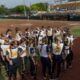 Michigan Softball huddled together before their final game of the season