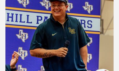 Alister Vallejo wearing a Michigan hat after announcing his commitment