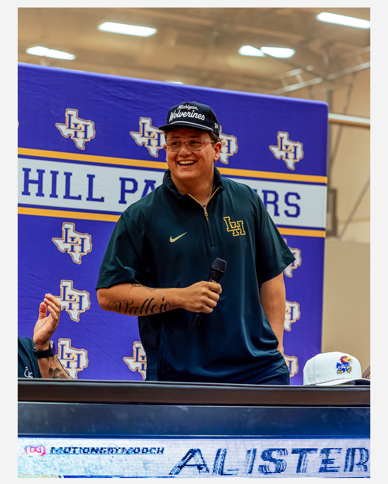 Alister Vallejo wearing a Michigan hat after announcing his commitment