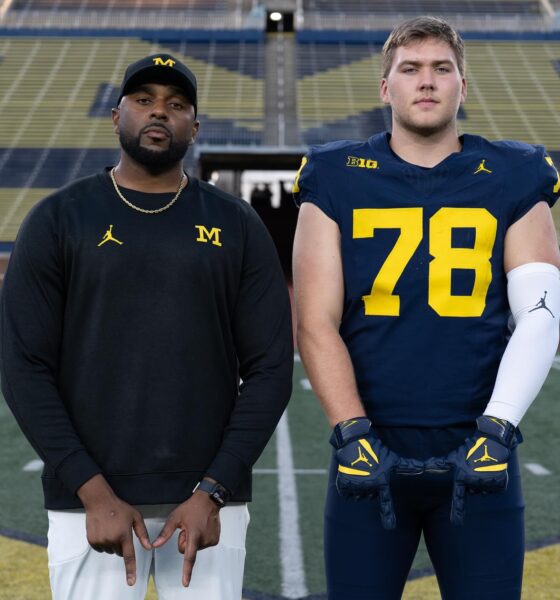 Marky Walbridge posing with Sherrone Moore in the Big House