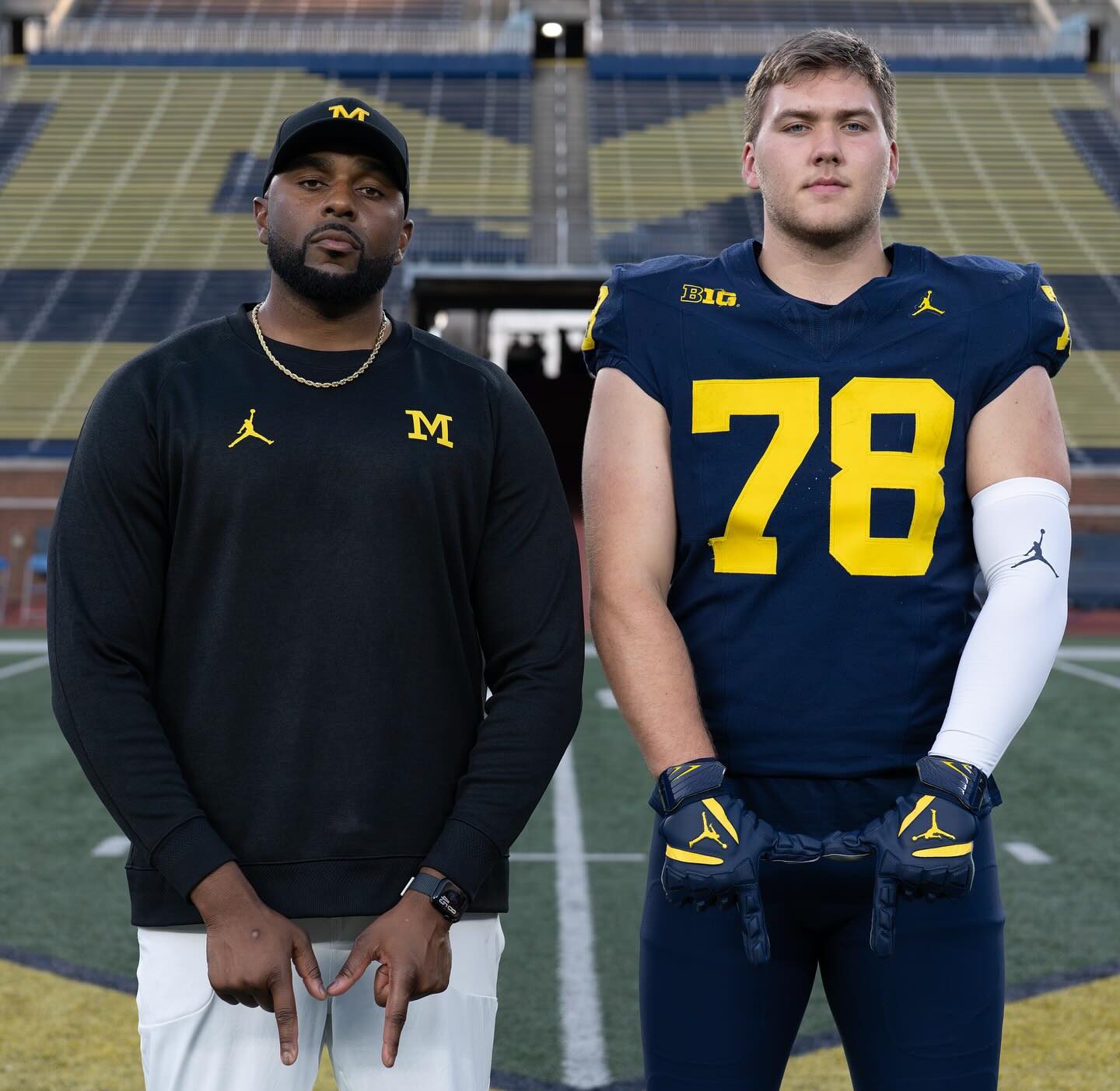 Marky Walbridge posing with Sherrone Moore in the Big House